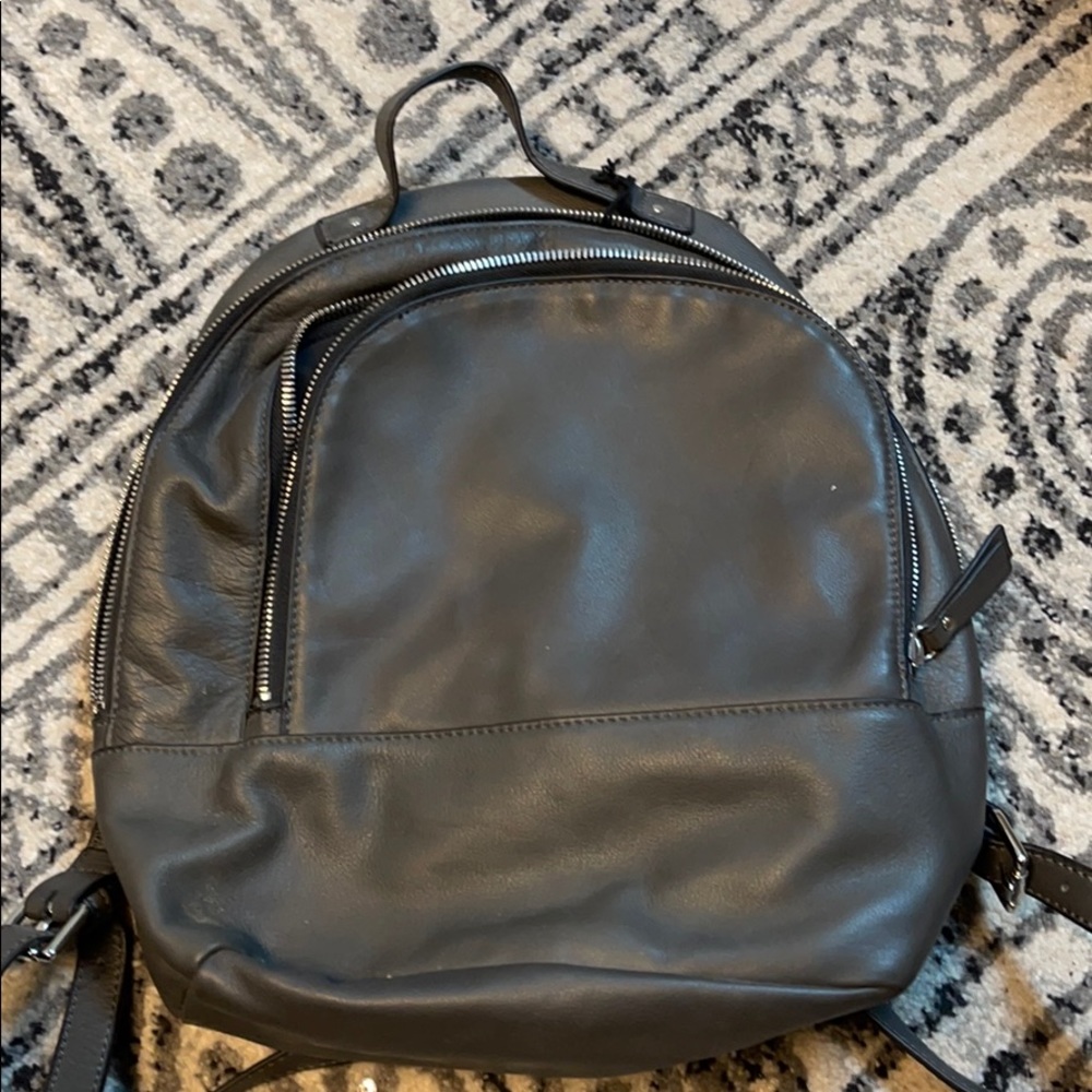 Grey leather backpack